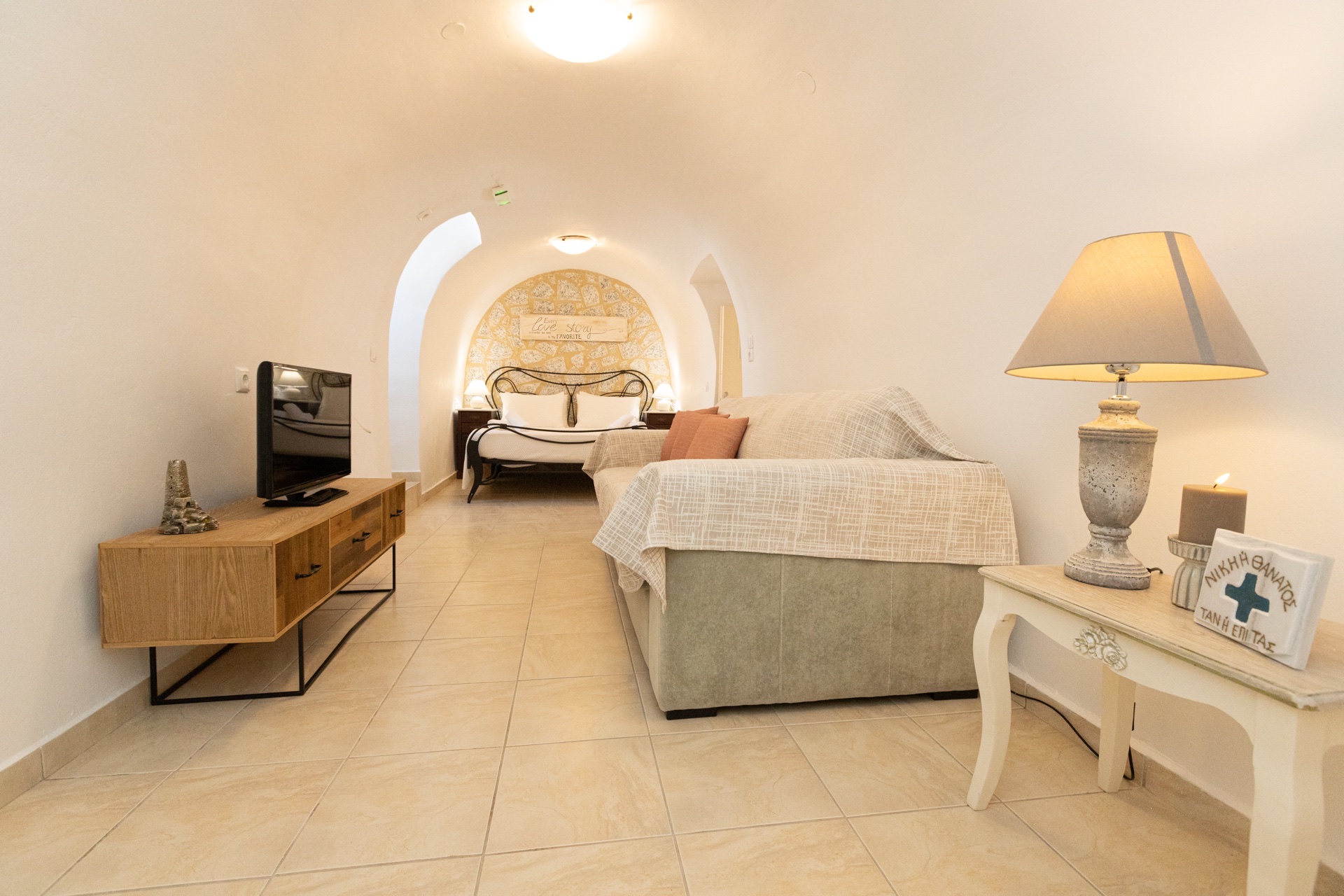 Master bedroom with vaulted stone arch ceiling, Koufantonis Mansion Mani