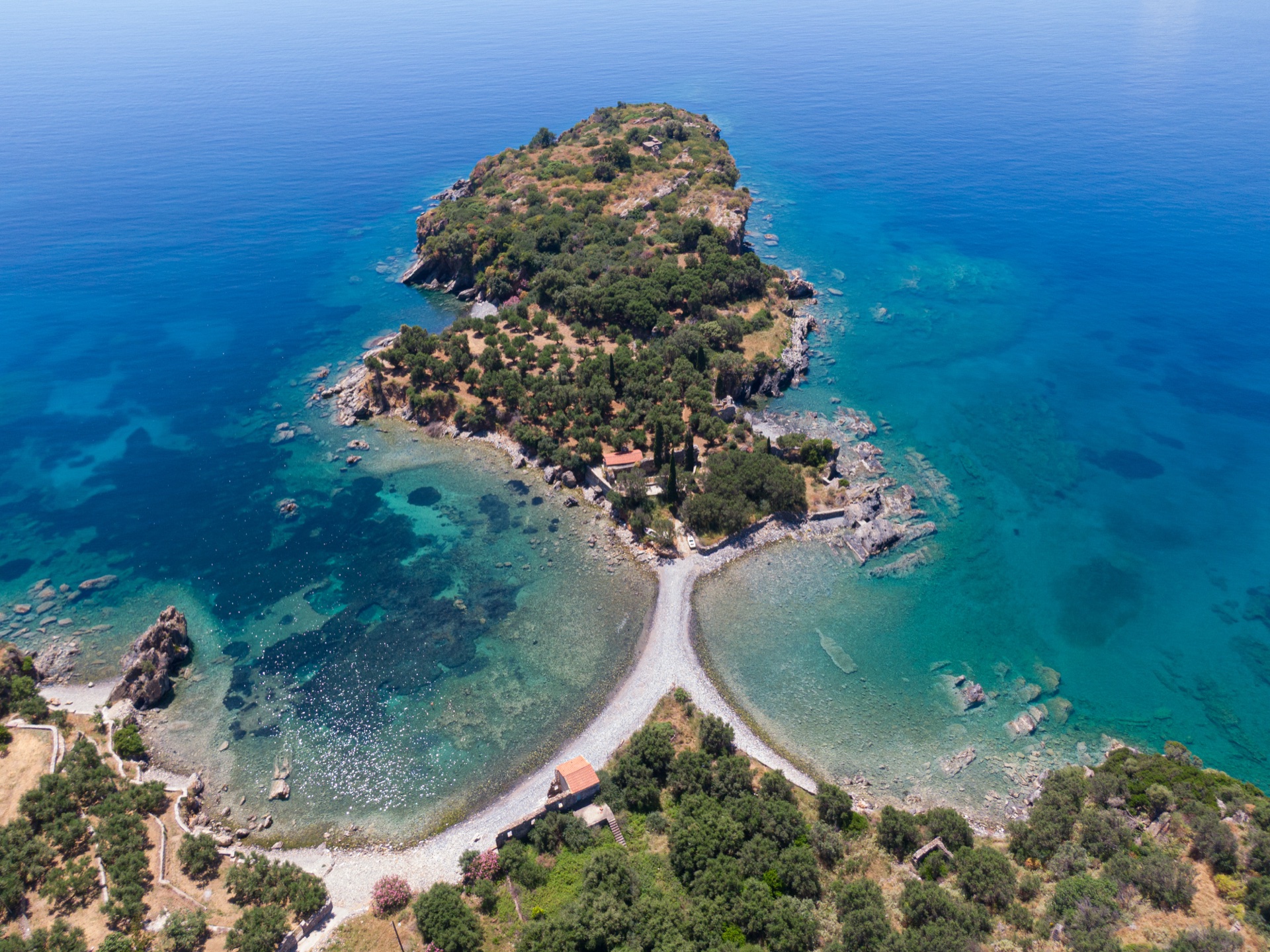 Aerial drone view of Skopa peninsula, East Mani Greece turquoise sea