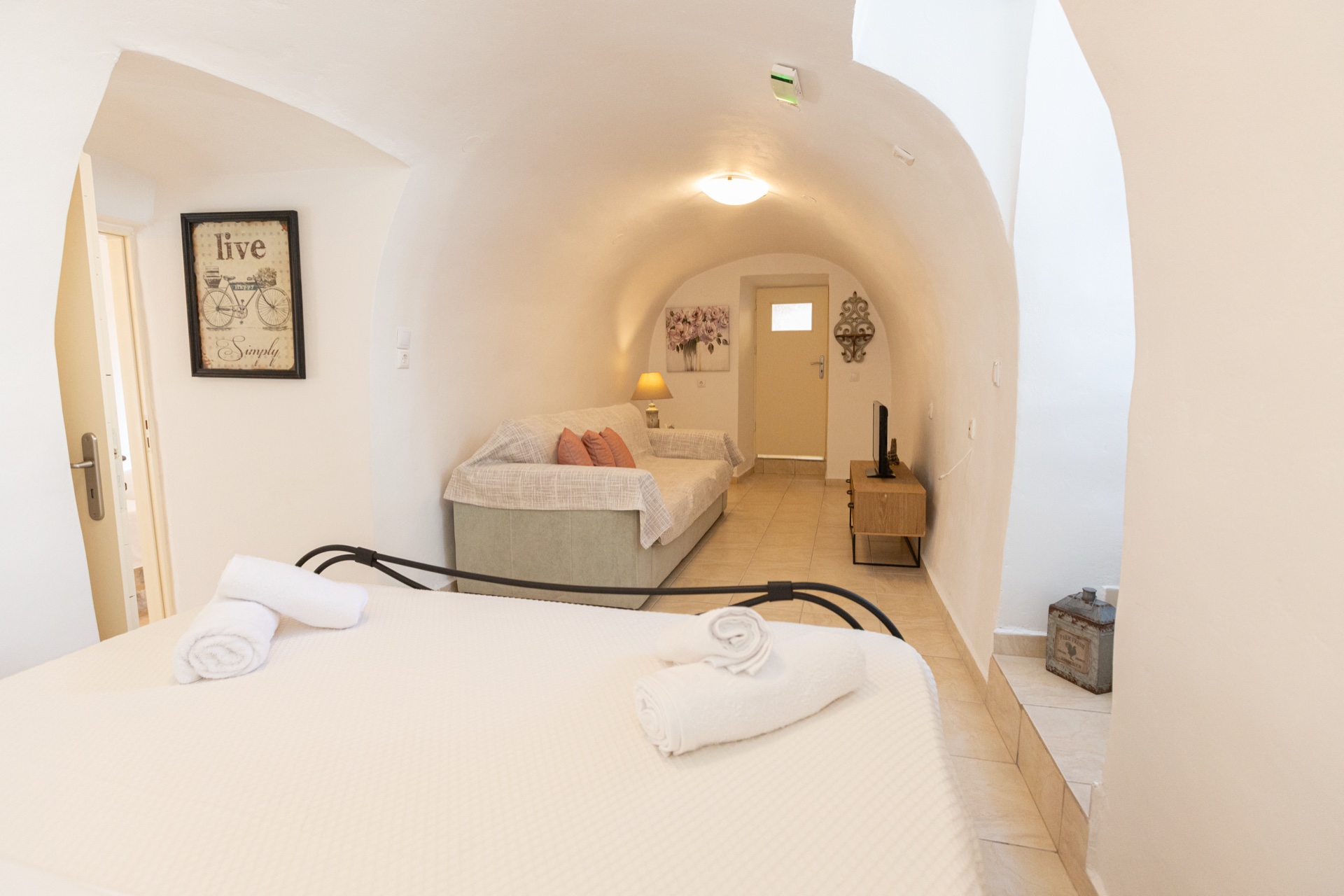 Spacious arched suite with double bed and sofa, Koufantonis Mansion Mani Greece