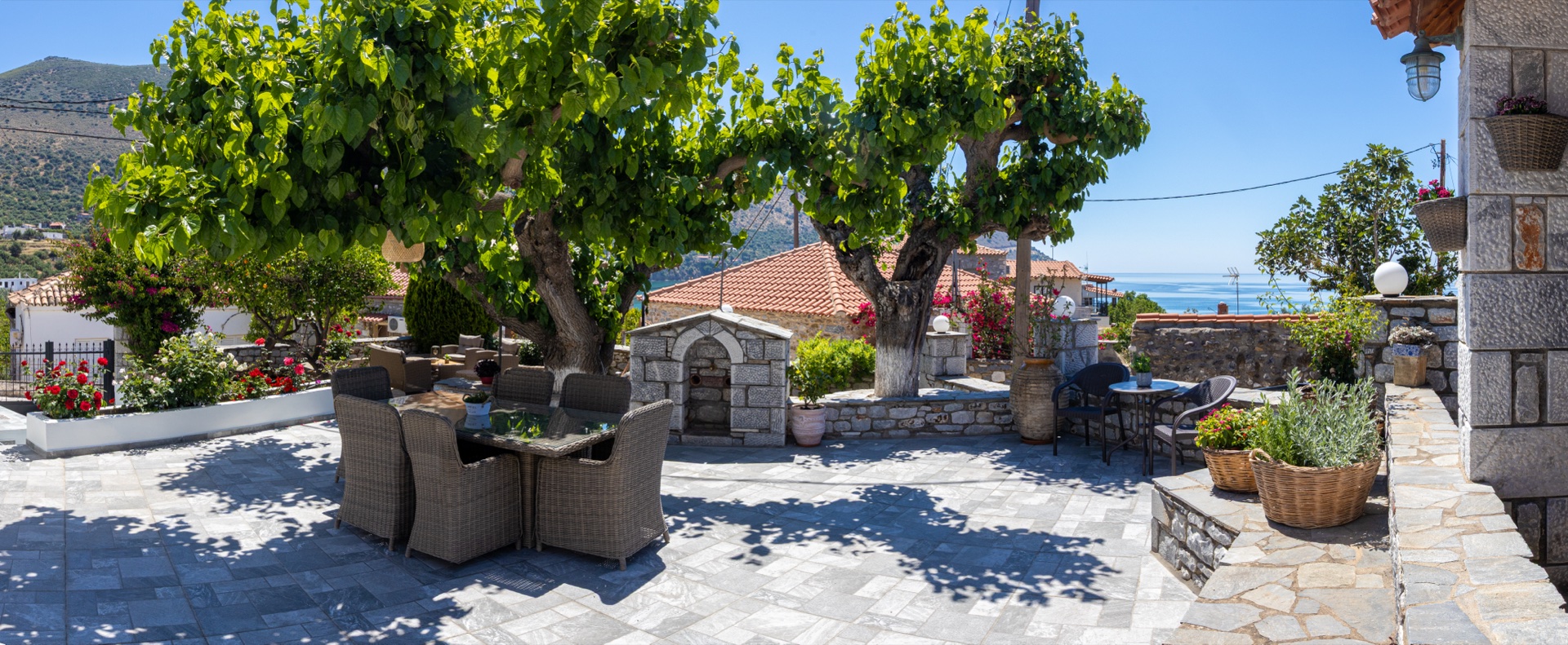 Outdoor terrace with sea view, traditional stone house Mani Greece